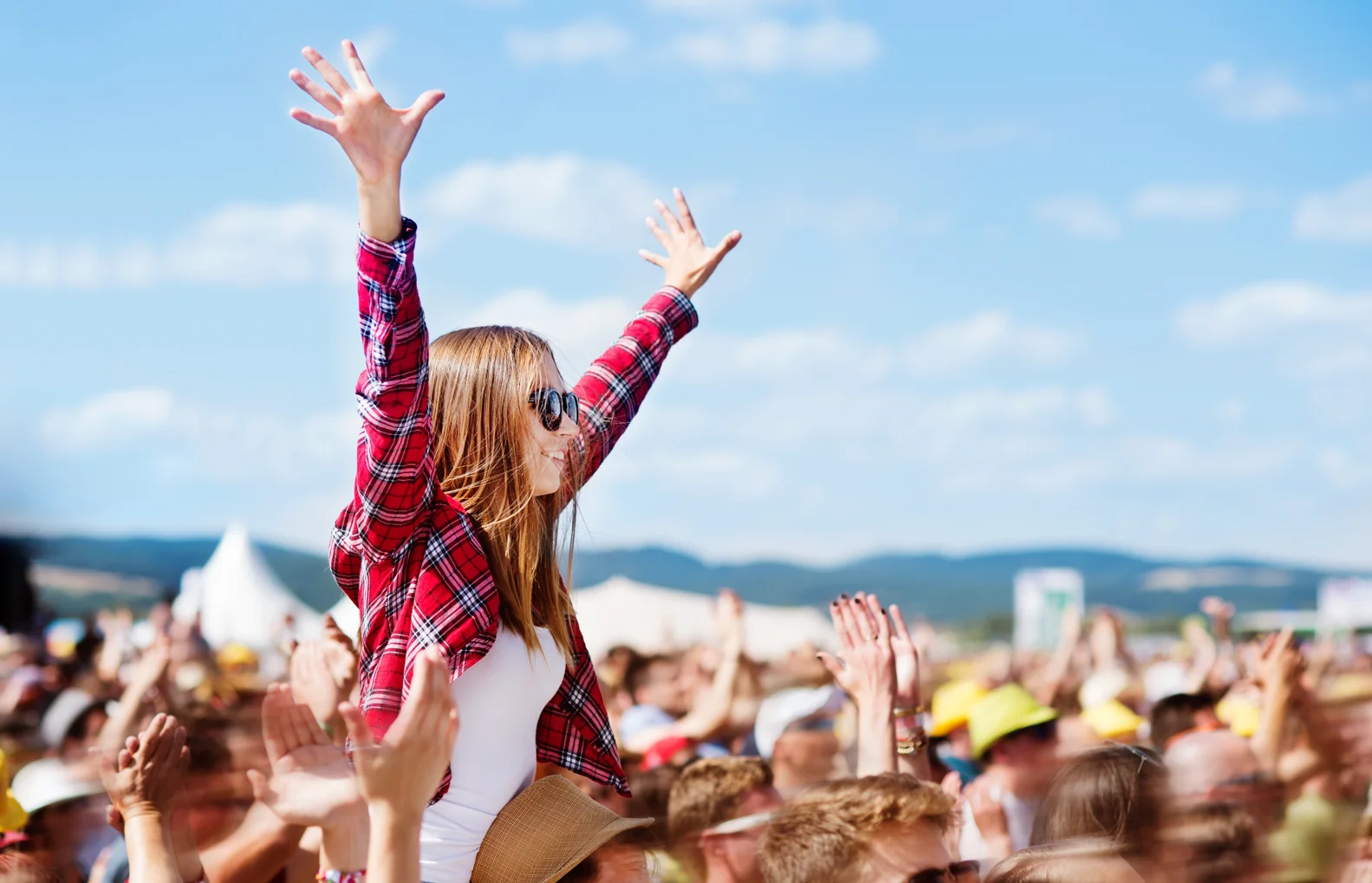 NDIS support worker helping participant access community event in Melbourne